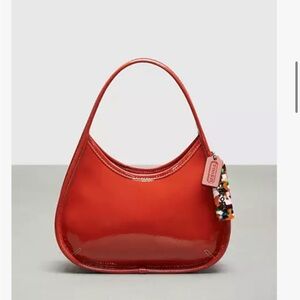 NWOT Burnt orange Coachtopia Ergo bag